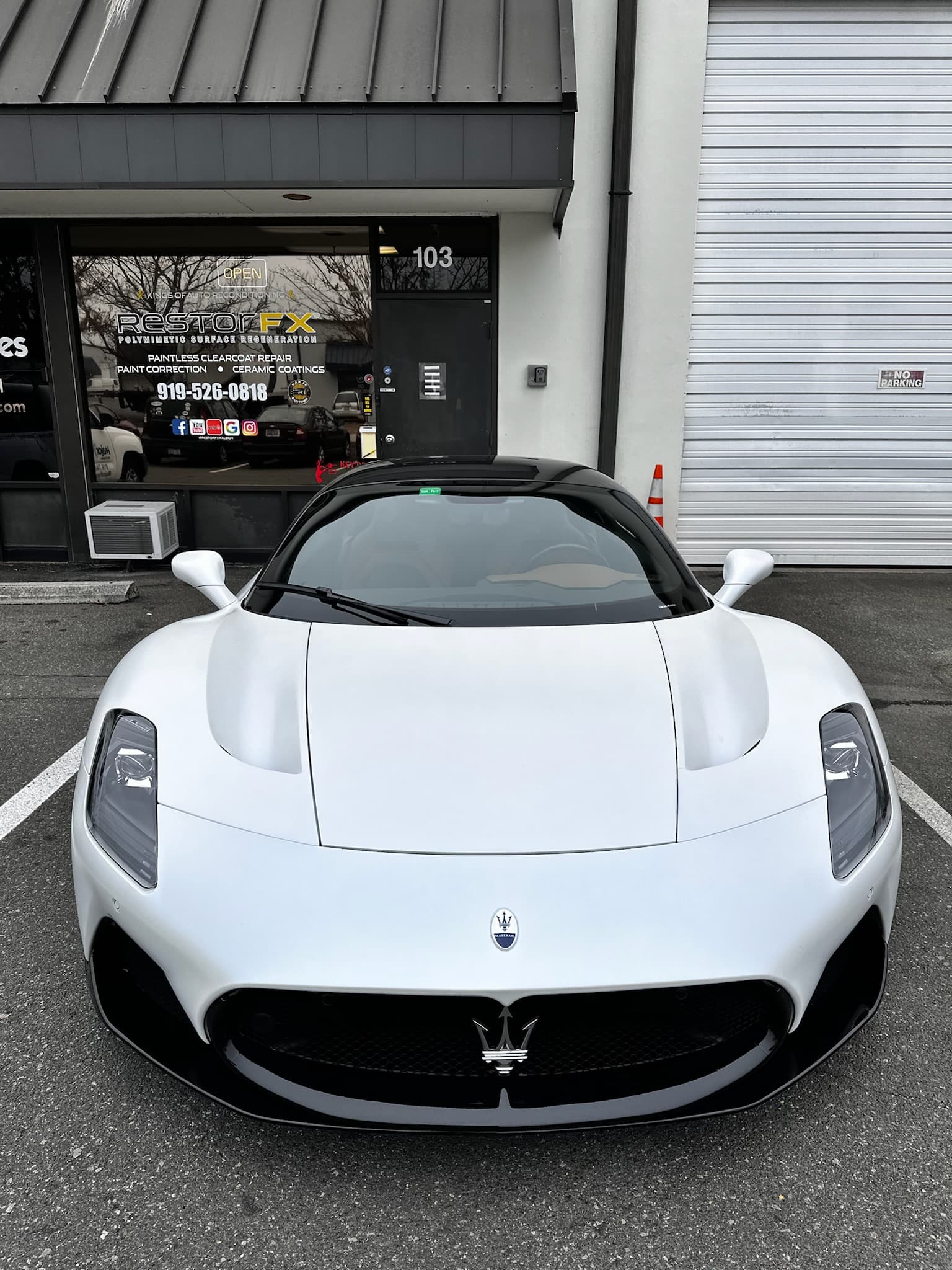 Professional vehicle detailing — exterior paint gloss restored